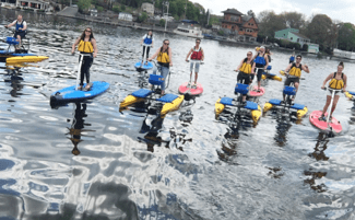 Group riding hyrdobikes on Lake Hopatcong