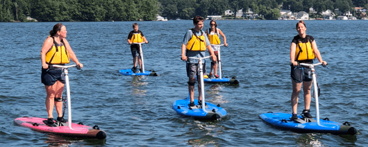 Group on pedalboards on Lake Hopatcong